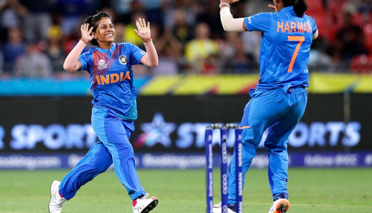 Poonam Yadav (left) celebrates with teammate Harmanpreet Kaur after taking the wicket of Australia's Jess Jonassen during the first game of the Women's T20 Cricket World Cup in Sydney on Friday